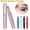 A set of pink and black electric eyebrow trimmers, including a main trimmer and several precision grooming tools.