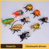 A collection of clockwork-driven insect toys including a ladybug, bee, and beetle in various colors like orange, green, and g