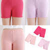 A set of three pink and lilac girls bow safety shorts for summer