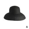 A black wide brim straw sun hat for women.