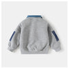 Gray fleece pullover sweatshirt with navy denim collar and sleeves