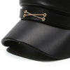 Black PU leather beret hat with gold-toned adjustable leather detailing