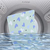 A light blue waterproof baby mattress protector with a cute cartoon design floating in water.