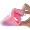 A hand holds a pink waterproof rain boot, showing its flexible design and non-slip features.