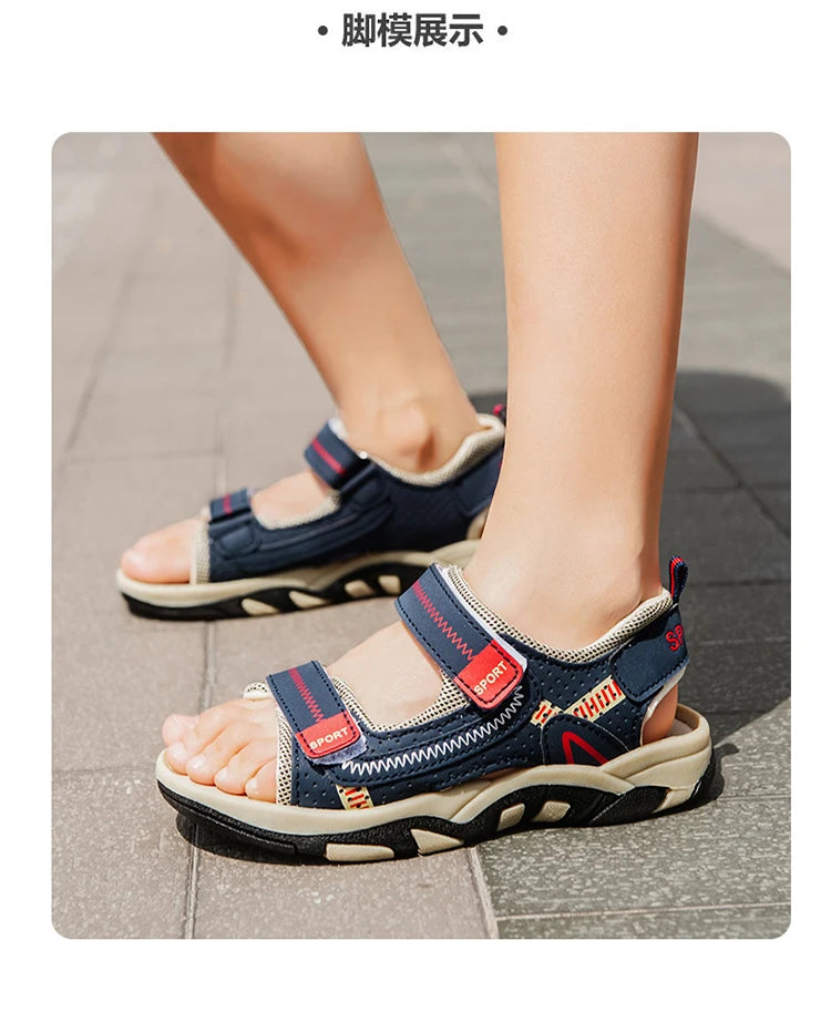 A close-up view of blue and white boys' breathable summer sport sandals with adjustable straps on a person's foot.