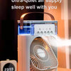A white personal air cooler fan and humidifier device with a night light is shown on a wooden surface.