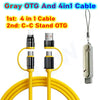 Câble OTG gris et câble 4en1 avec adaptateur OTG C-C et plusieurs câbles.