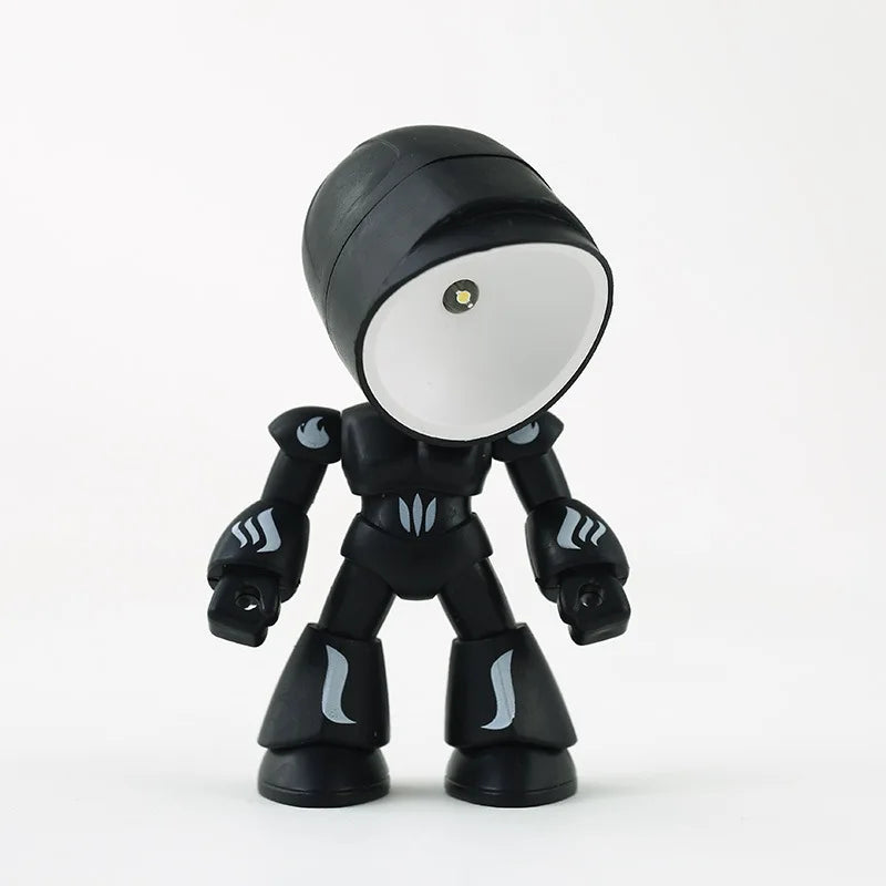 A black cartoon hero police night light with a round white lamp and glowing accents.