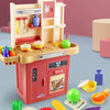 A pink and yellow kids play kitchen set featuring cooking utensils, pots, and food items.