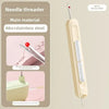 A portable needle threader made of ABS and stainless steel with a warm cherry white handle.