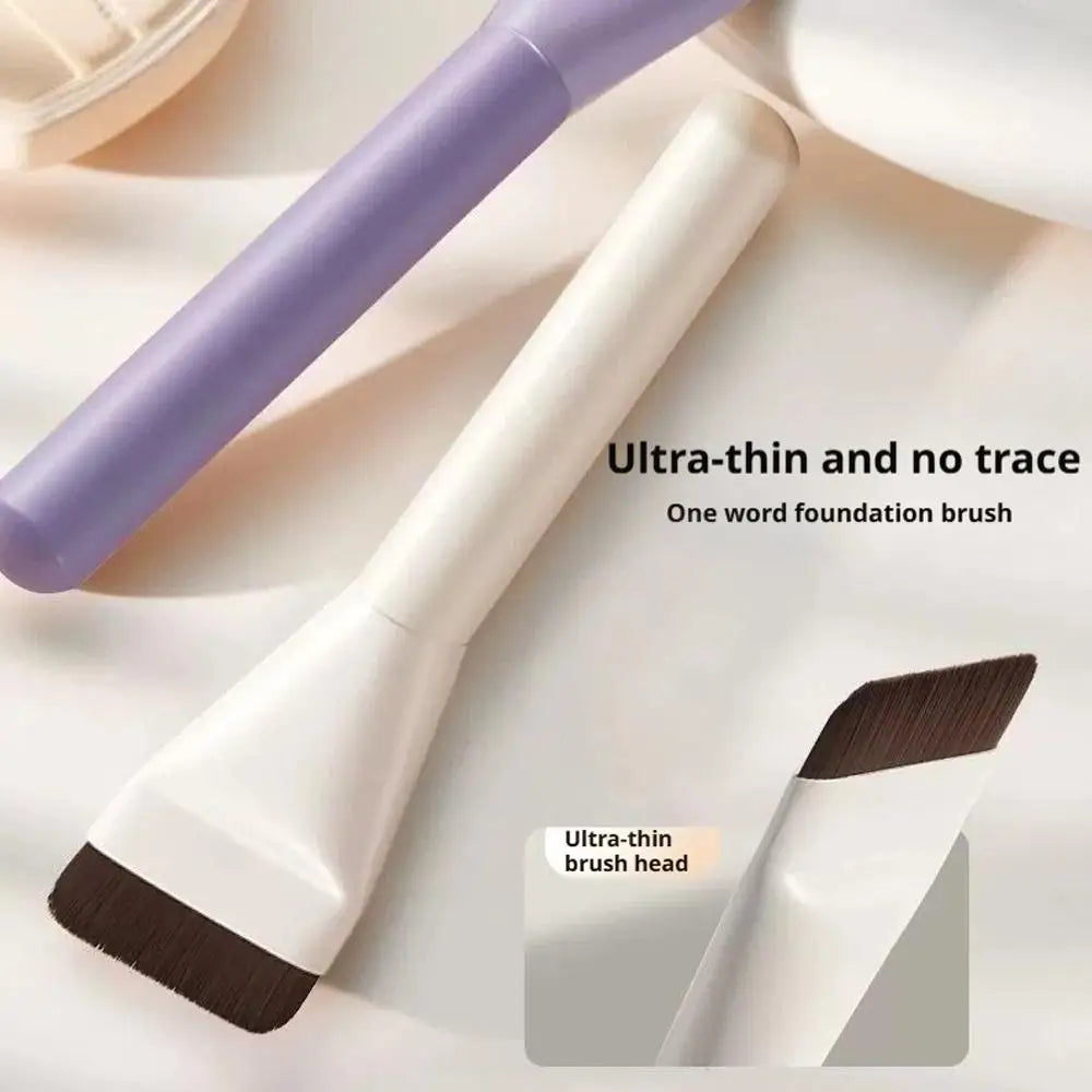 A purple and white ultra-thin foundation brush is shown with a close-up view of the brush head.