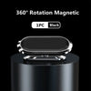 A black magnetic 360° rotating phone mount is shown mounted on a dark cylindrical base.