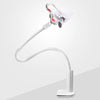 Un soporte de teléfono flexible de cuello de cisne blanco con una abrazadera sobre un fondo gris claro.