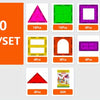 A set of magnetic building blocks with various shapes and colors including triangles, squares, arches, and a gift item.