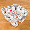 En samling julekort med resin-charm og festlige design.