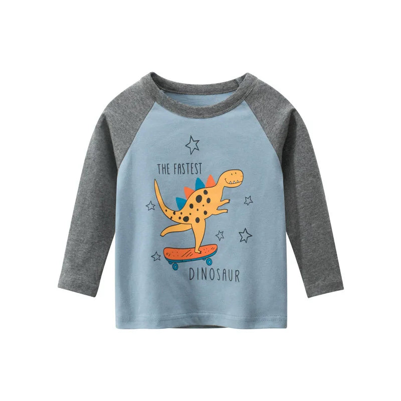A gray long sleeve shirt with a light blue dinosaur print featuring a fast dinosaur riding a skateboard.
