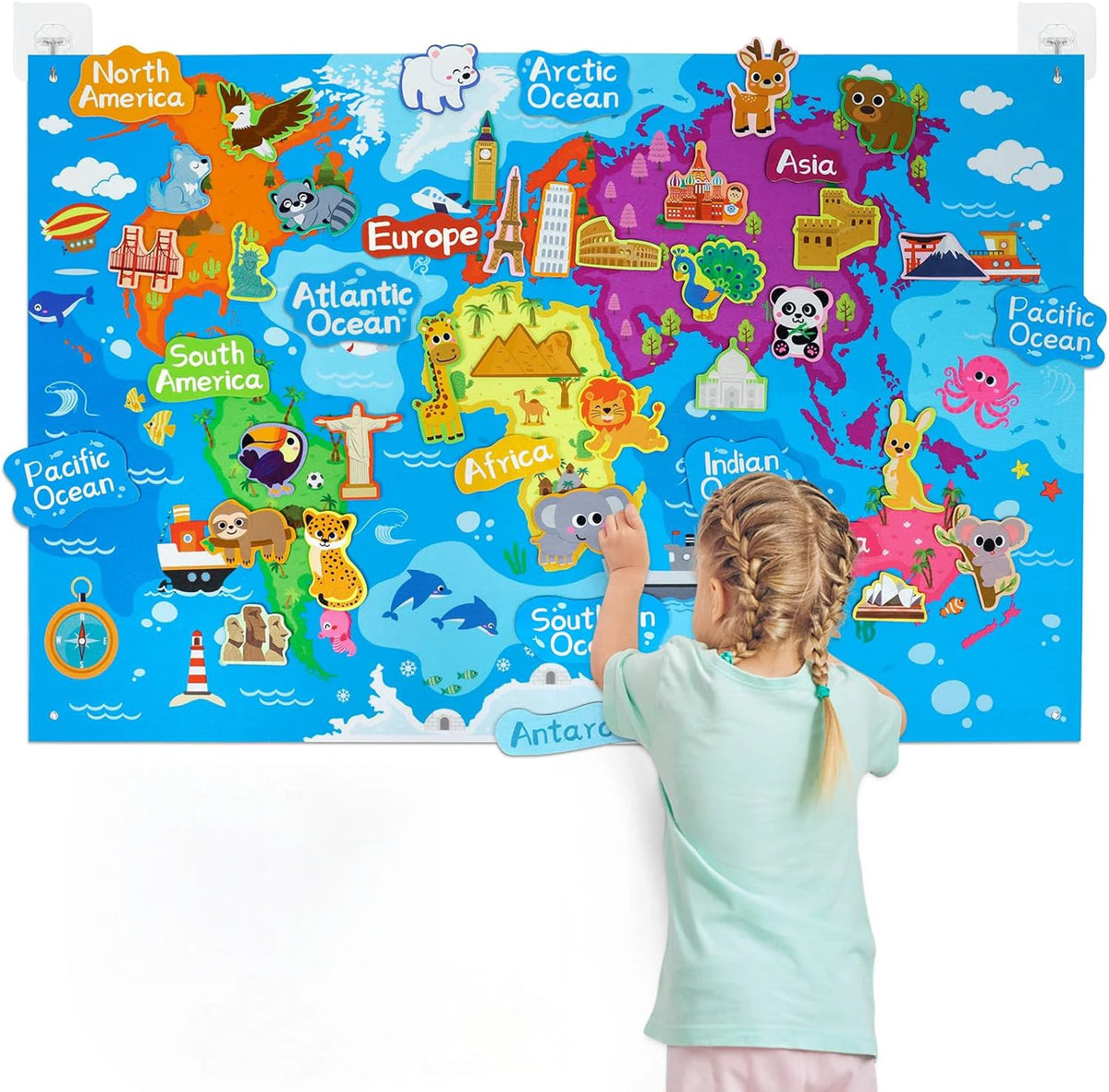 A colorful felt story board map showing continents and various zoo animals for interactive learning.