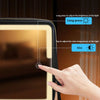 A hand adjusts the brightness and color temperature of an LED lighted makeup case with a mirror.