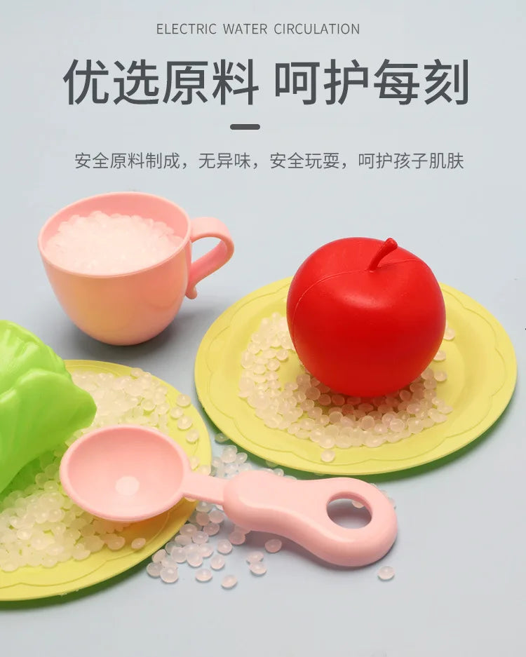 A set of pretend play kitchen sink components including a pink cup, a red apple, and small white beads on yellow plates.