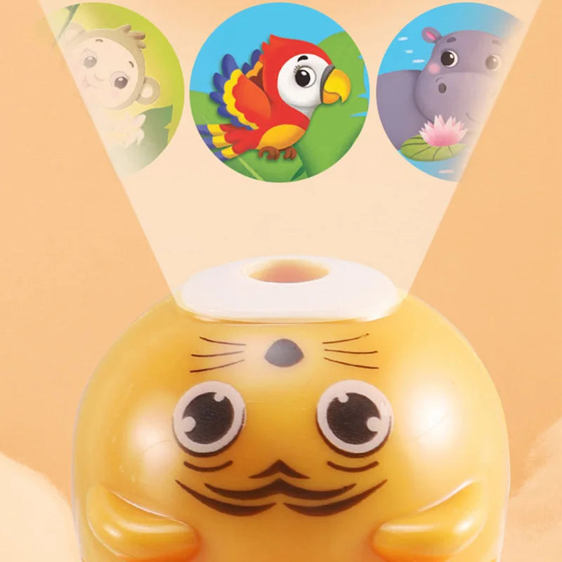 A yellow, cat-shaped projector flashlight is shown with three colorful story cards projecting light.