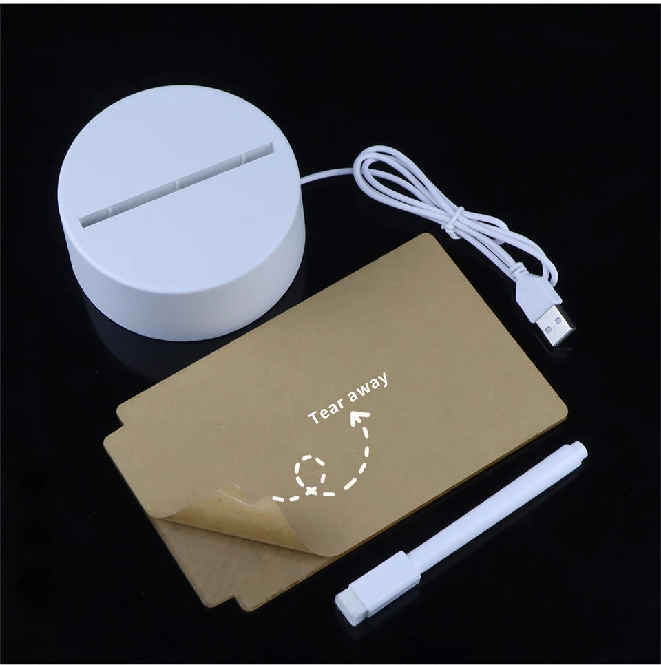 A white acrylic message board with a pen and cord is shown next to a brown paper note marked Tear away
