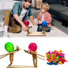Træspil til ballonkamp med træaffyringsramper og farverige balloner til to spillere