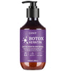En mørkbrun flaske med GOTWP Botox Keratin Hårmaske og svart pumpe.