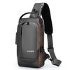 Bolso bandolera antihurto para hombre, gris oscuro y marrón, con correa negra.