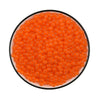 A circular black dish filled with 300 orange water beads.