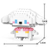 A white and pink micro building block figurine of a dog or animal, shown from the front with dimensions provided.