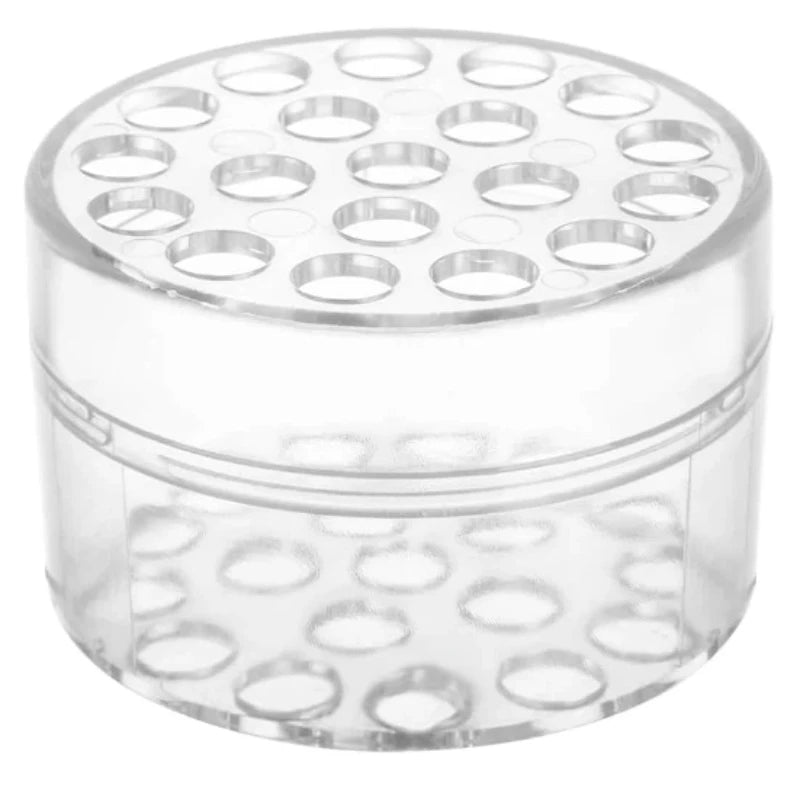 Clear plastic spiral flower arrangement holder with multiple small openings for arranging flowers