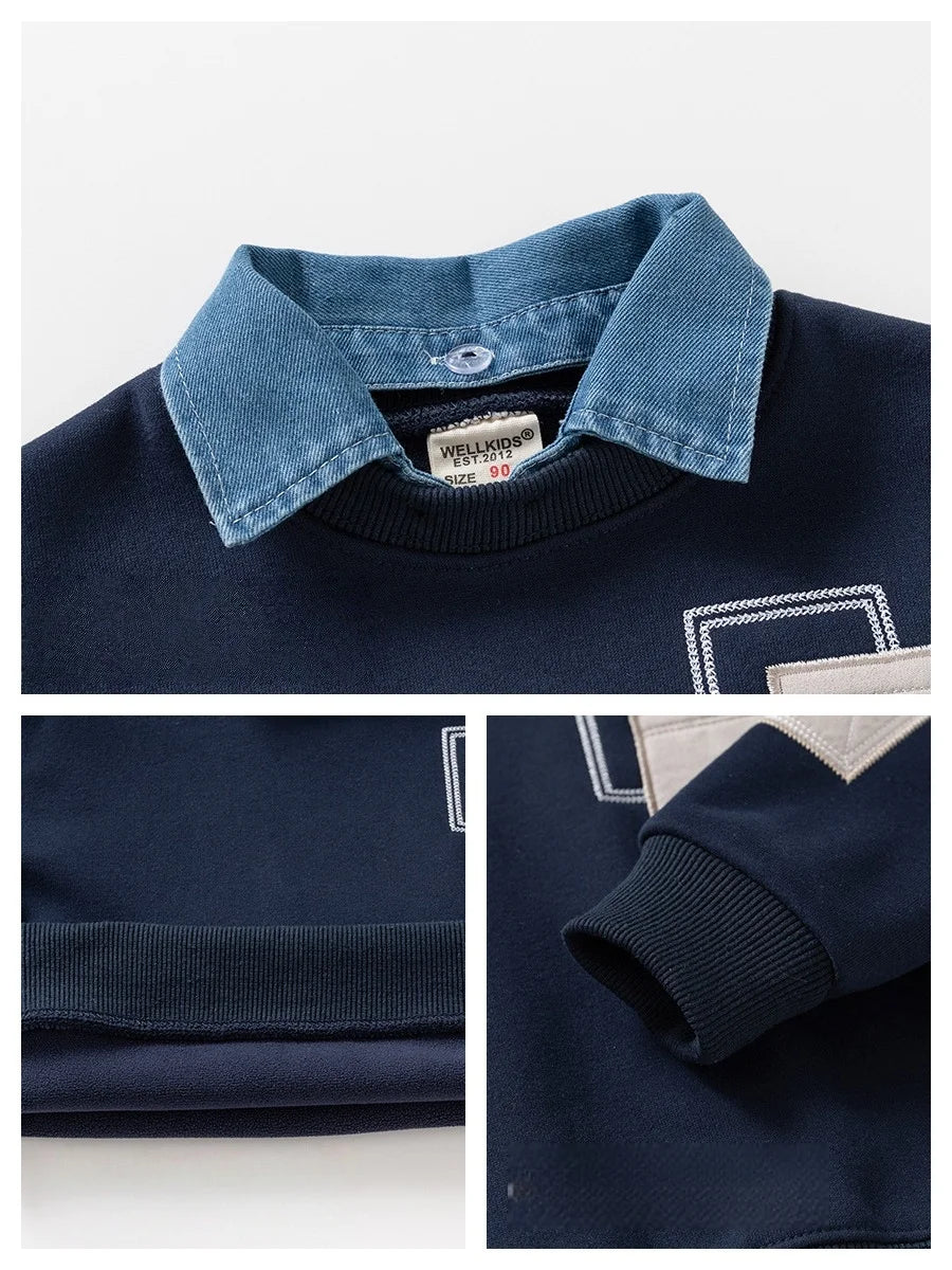 Navy blue boys' fleece pullover sweatshirt with a denim collar and white stitching detail.