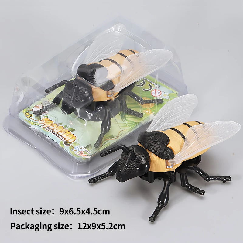 A clear plastic package containing wind-up insect toys, including a ladybug, bee, and beetle.