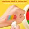 A hand is gently wiping colorful finger paint off the skin with a white wipe, demonstrating an environment-friendly and easy-