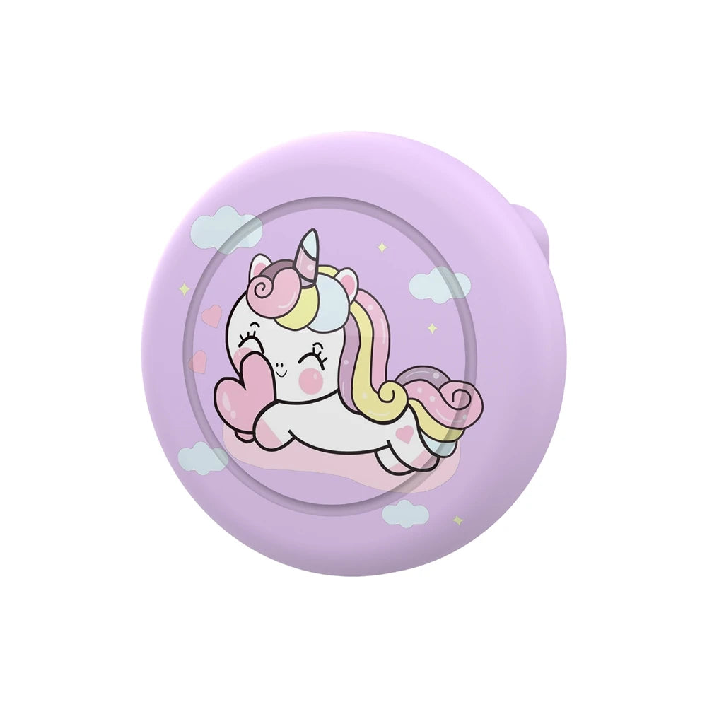 A round, light purple silicone protective case for an Apple AirTag featuring a white unicorn design.