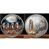A commemorative space coin featuring astronauts and the moon, titled The Path Back to the Moon.