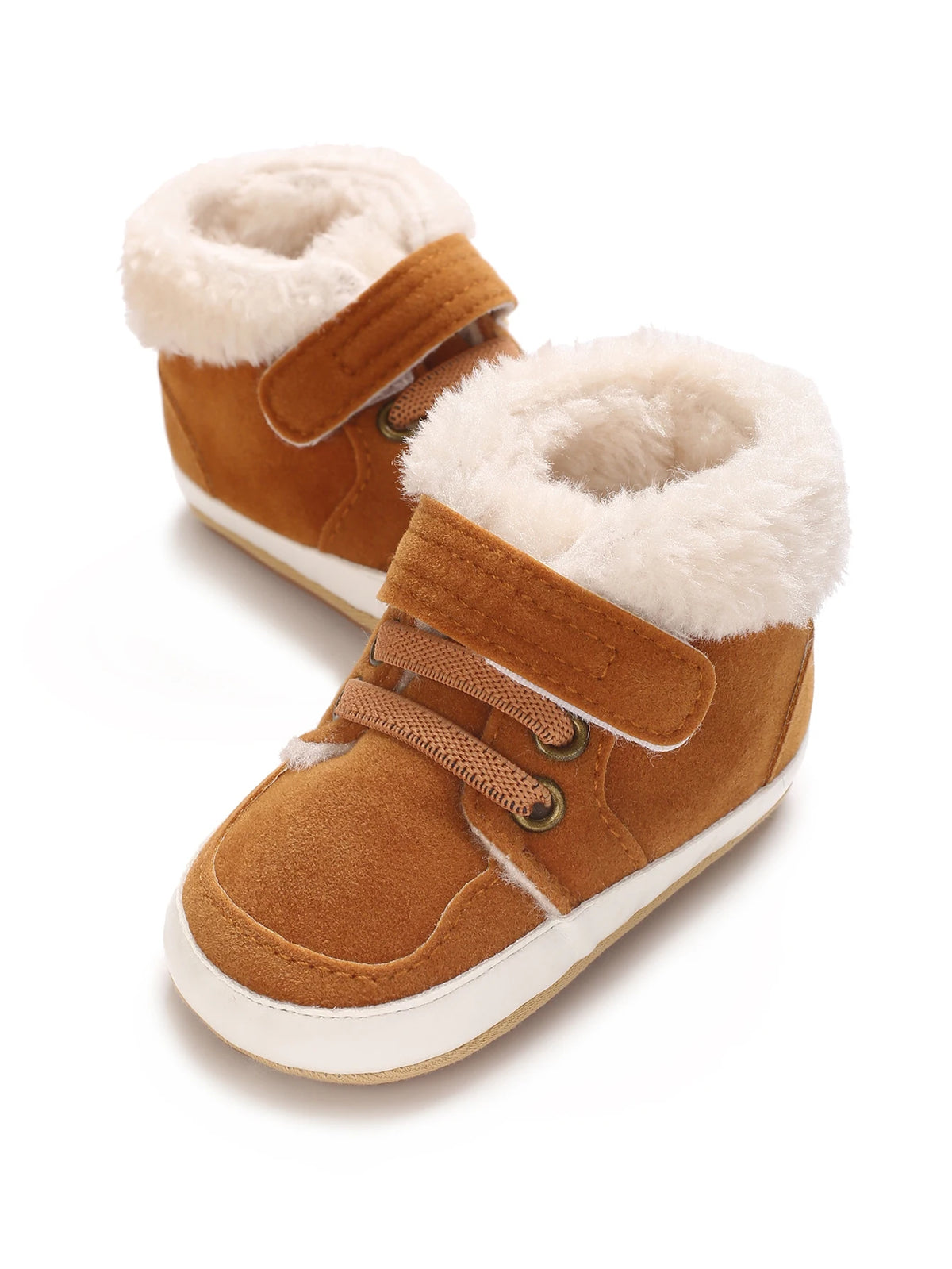 A pair of brown suede baby winter snow boots with fluffy cream-colored faux fur trim.