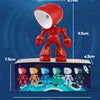 A red cartoon hero police night light with various colored figures and distance markers.
