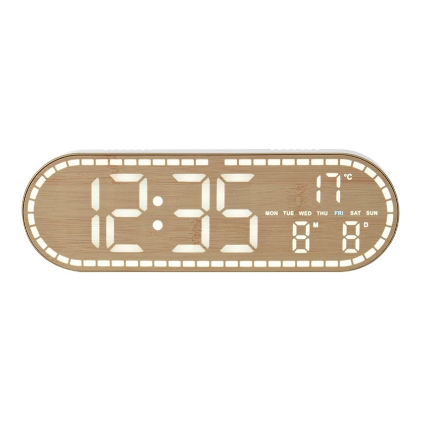 A light wood-toned digital wall clock displaying the time 12:35, temperature, and day of the week.
