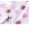 White children's short-sleeve shirt and shorts set with pink and brown polka dots