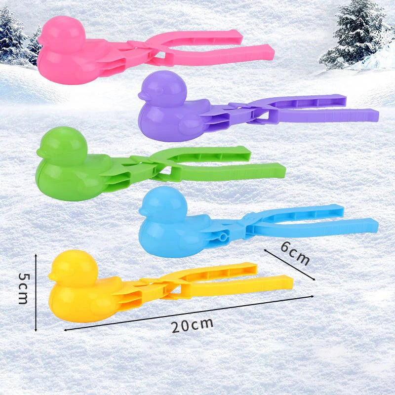 Colorful duck-shaped rice molds in pink, purple, green, and blue are shown against a snowy background.