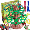 Caja del juego de mesa Jumping Monkey Climbing Tree con piezas trepadoras y estructura de árbol de madera.