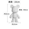 A white bear figurine kit showing various height measurements.