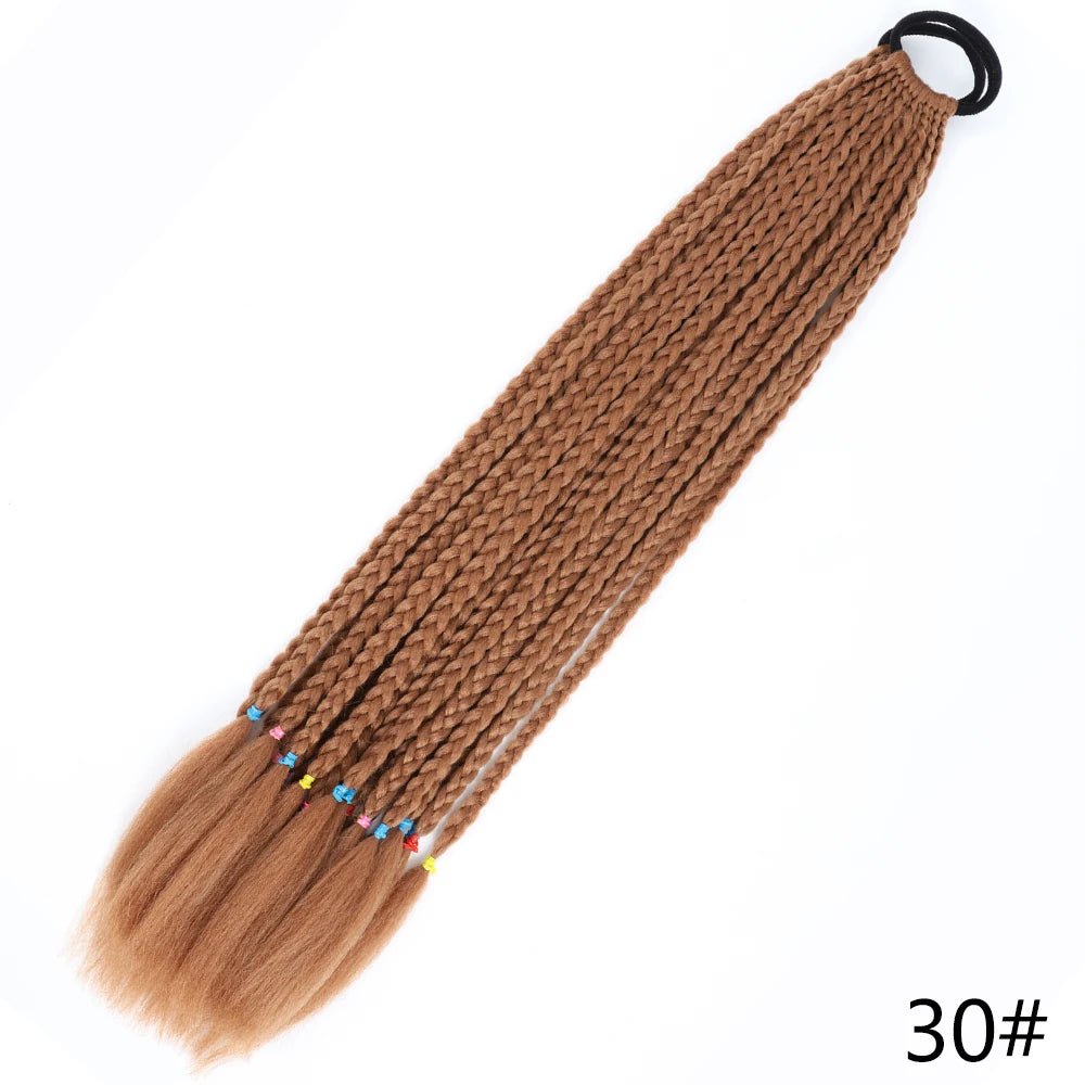 A brown gradient pre-braided ponytail extension with an elastic band.