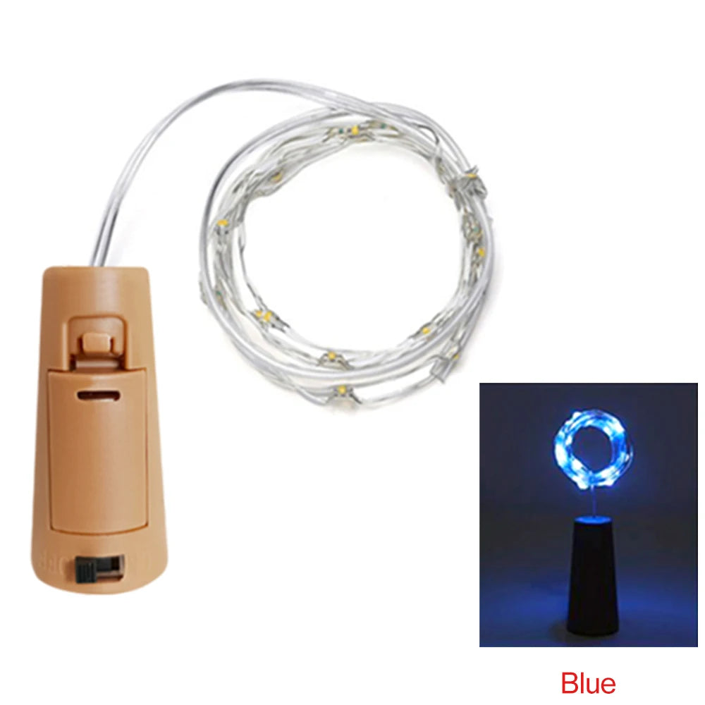A roll of blue LED fairy lights with a connector and a stand for decoration