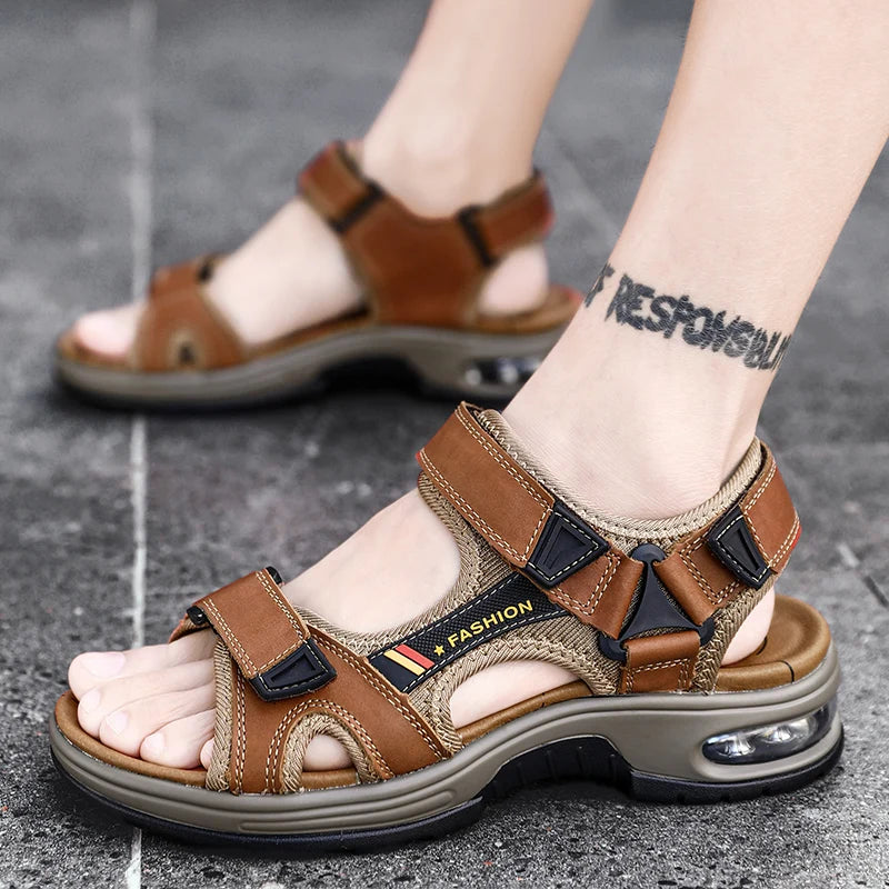 A pair of brown men's genuine leather air cushion sandals worn on a foot.