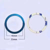 A circular, thin magnetic phone holder with a blue finish and markings for size.