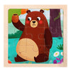A puzzle featuring a cute brown bear holding a pot and a large light-colored oval shape.