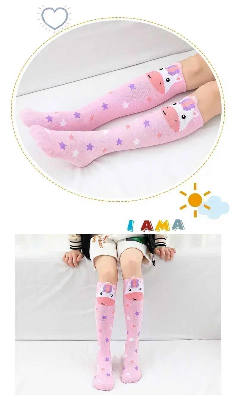 Pair of pink cotton knee-high socks for kids featuring cartoon animal designs