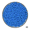 A pile of 300 colorful blue water beads in a circular container.
